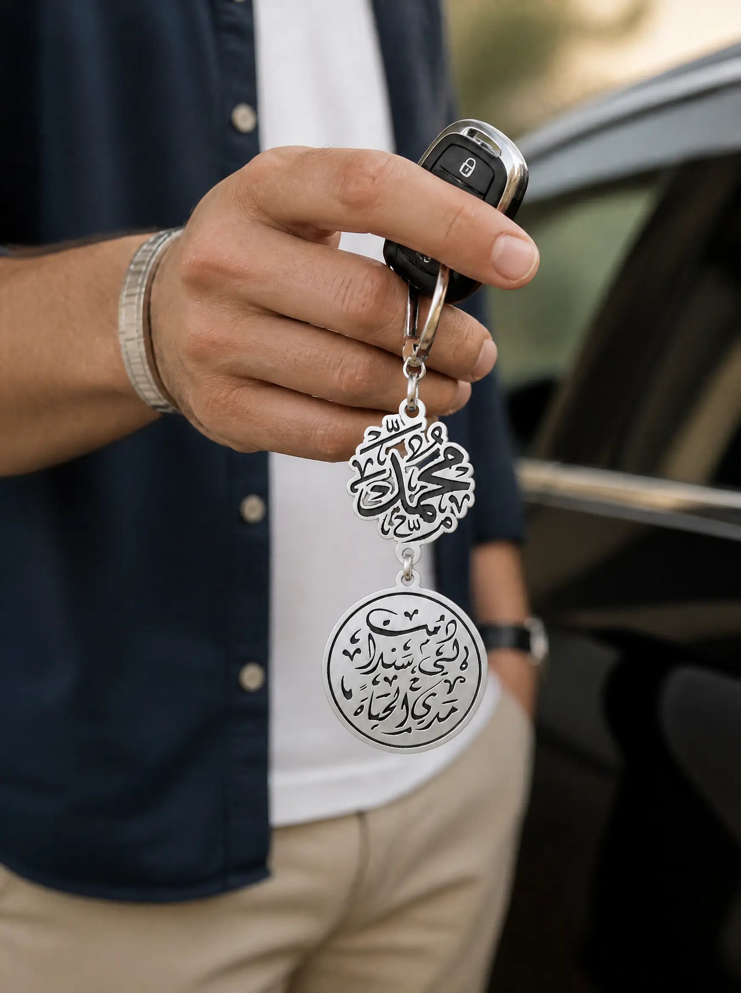 ميدالية مفاتيح مطلية فضة